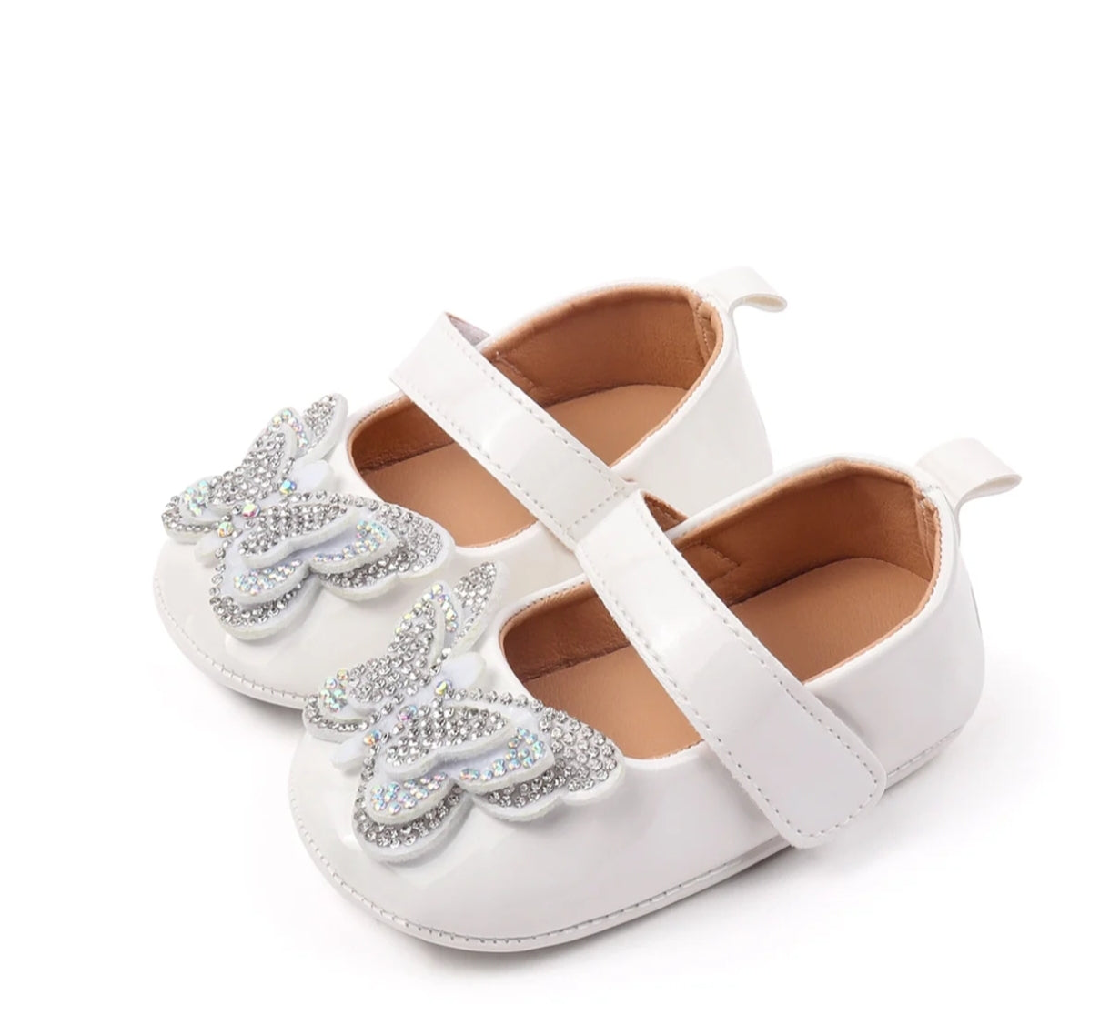 Acc. Zapatito bebé con diseño de mariposa brillante