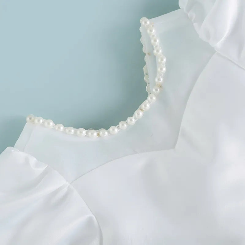 Vestido blanco con detalles en perlitas