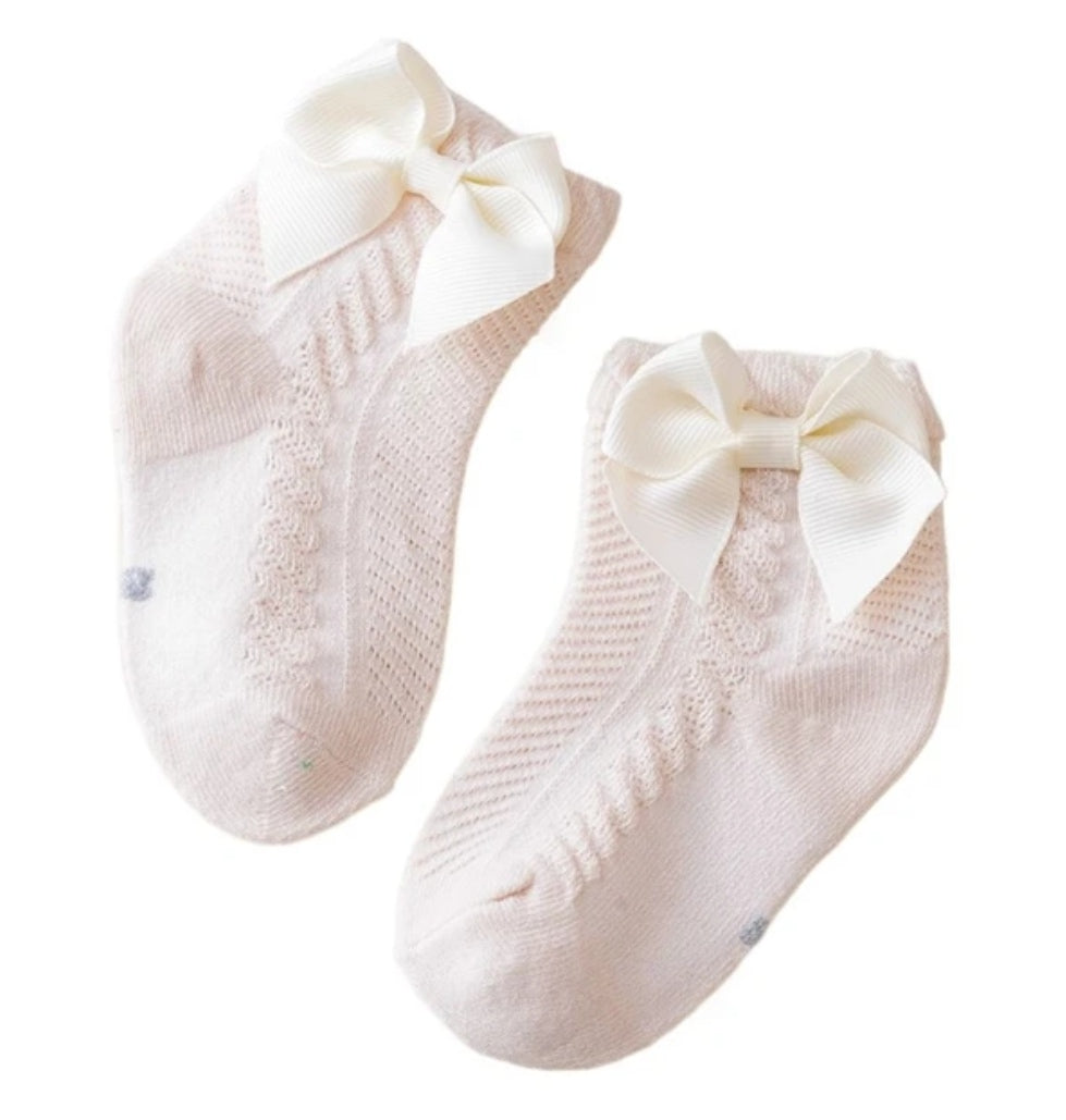 Acc. Calcetines con moño lateral