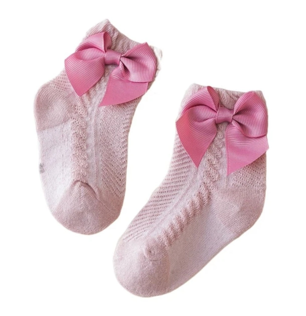 Acc. Calcetines con moño lateral