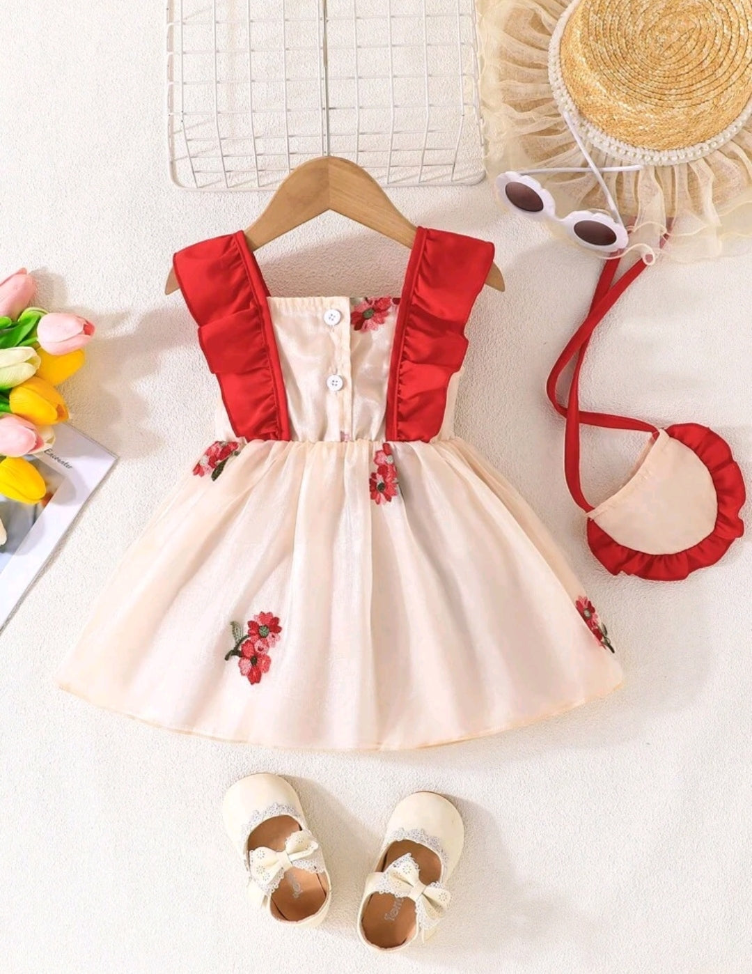 Vestido bebé con detalles floral + bolsito