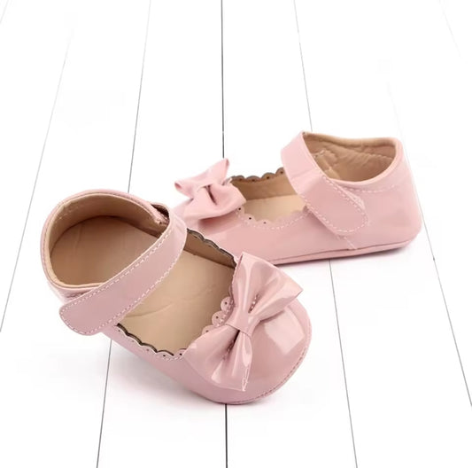 Acc. Zapatito con moño frontal