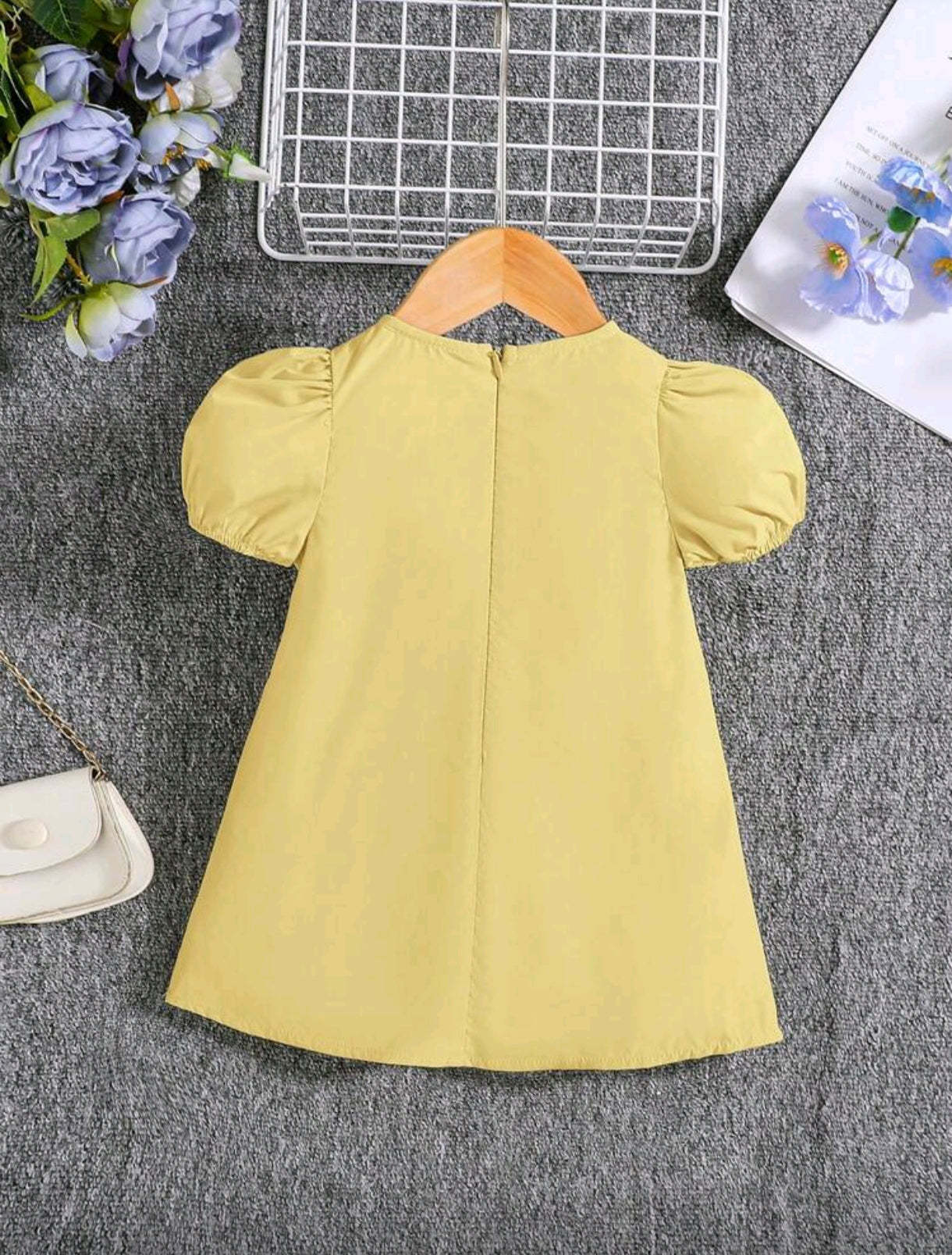 Vestido bebé con mangas farol y moños