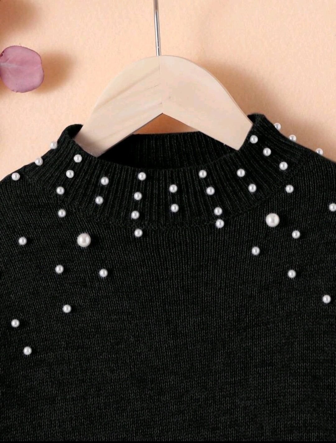 Suéter con detalles en perlitas