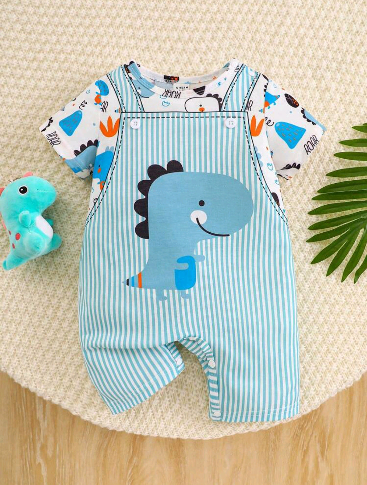 Mono suave con estampa de dinosaurio