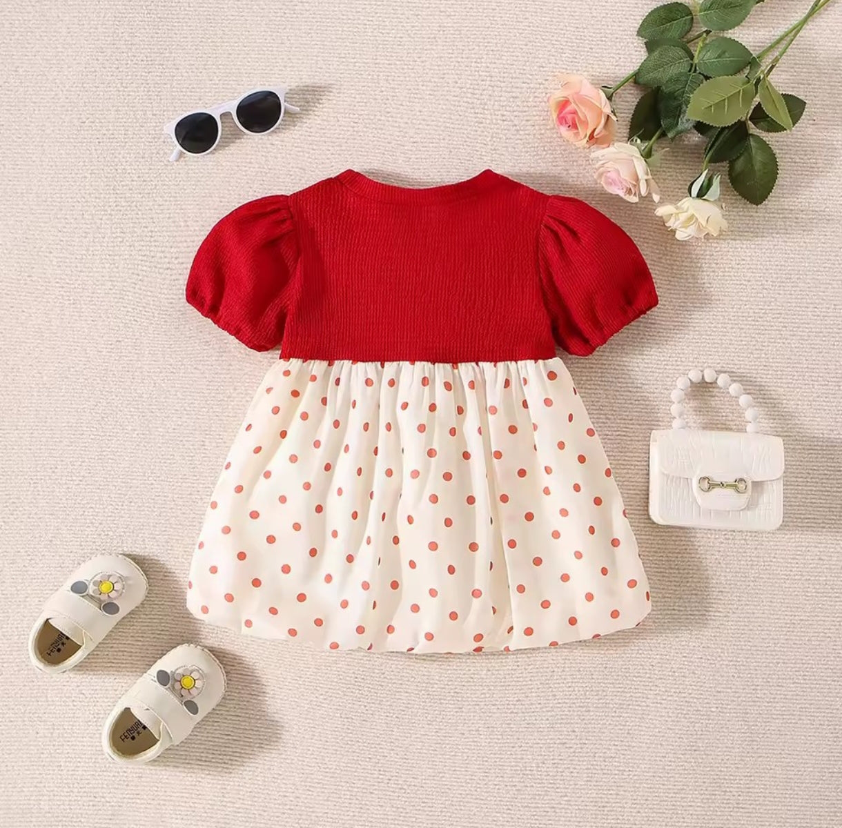 Vestido bebe con a motas y moño