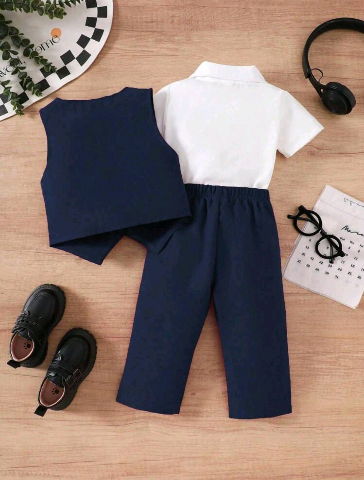 Chaleco + pantalón de vestir ( no incluye camisa)