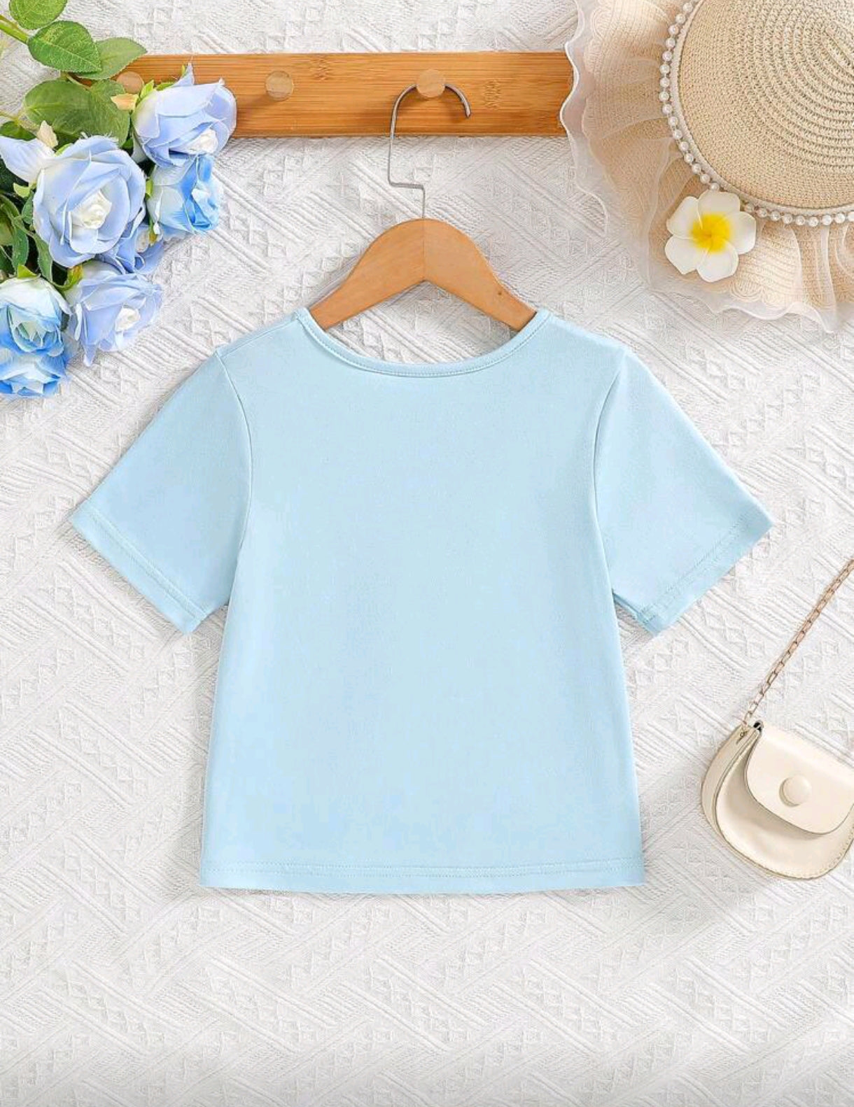 Remera con detalles en moños