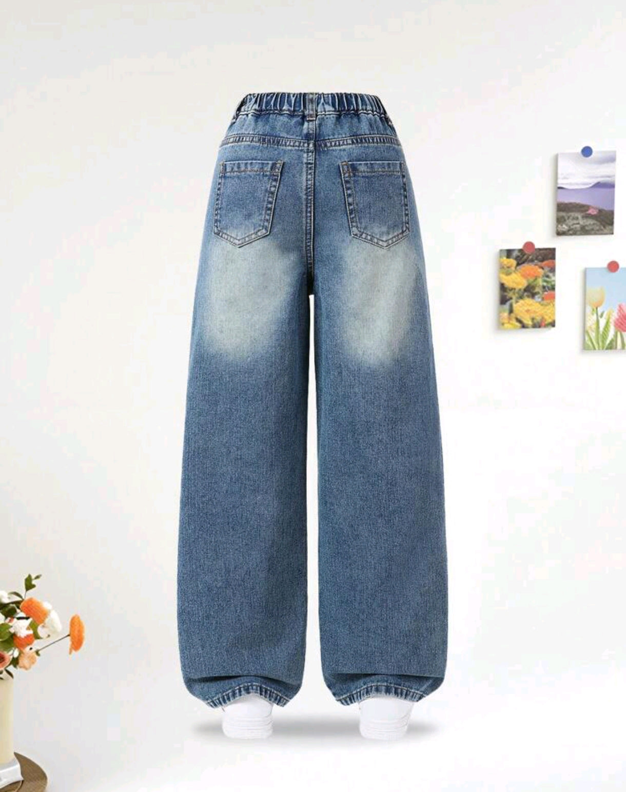 Pantalón de Jeans con bordados floral y moños