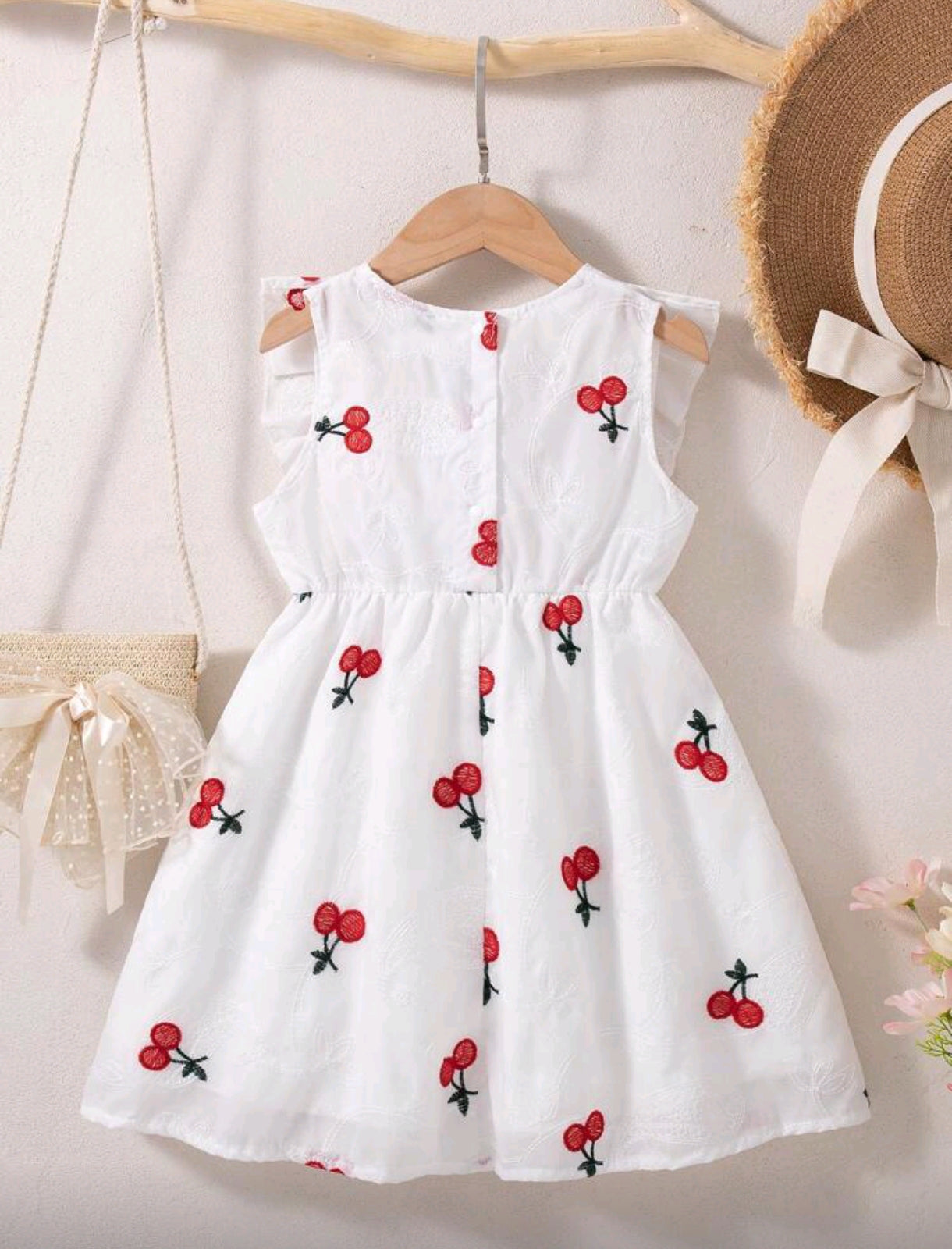 Vestido tipo broderie con bordados de cereza