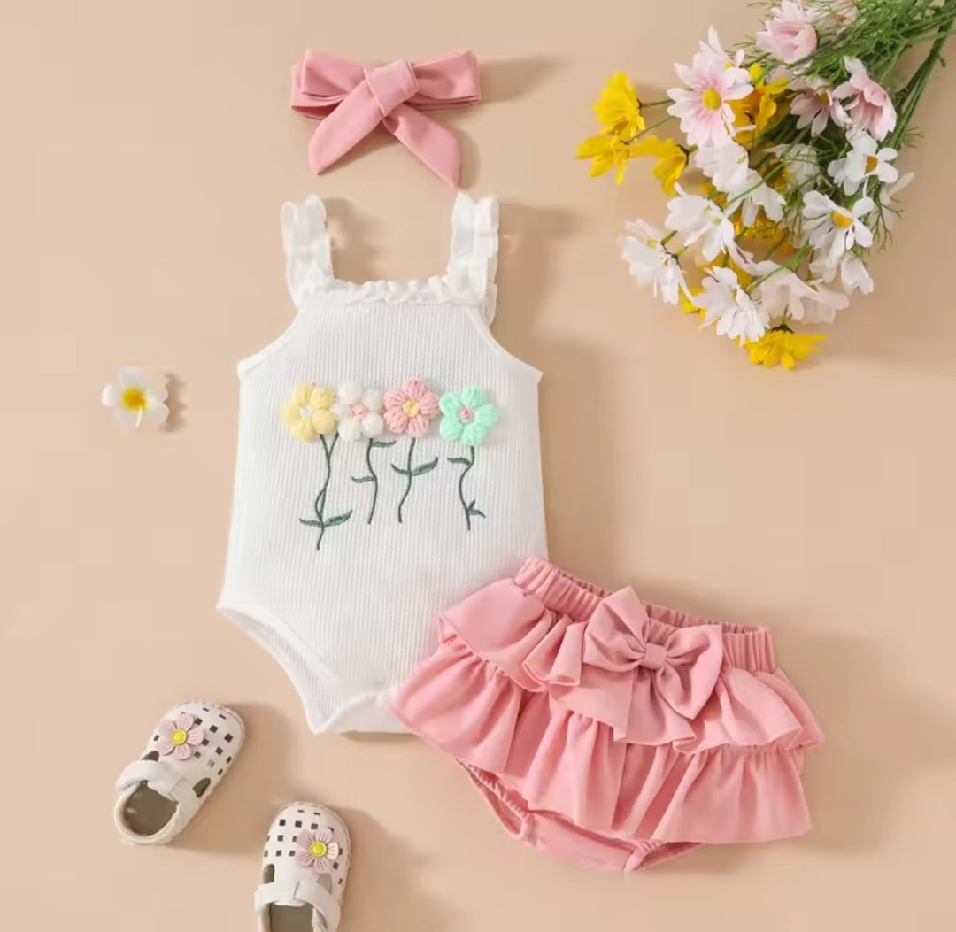 Body acabado con flores + short pollera