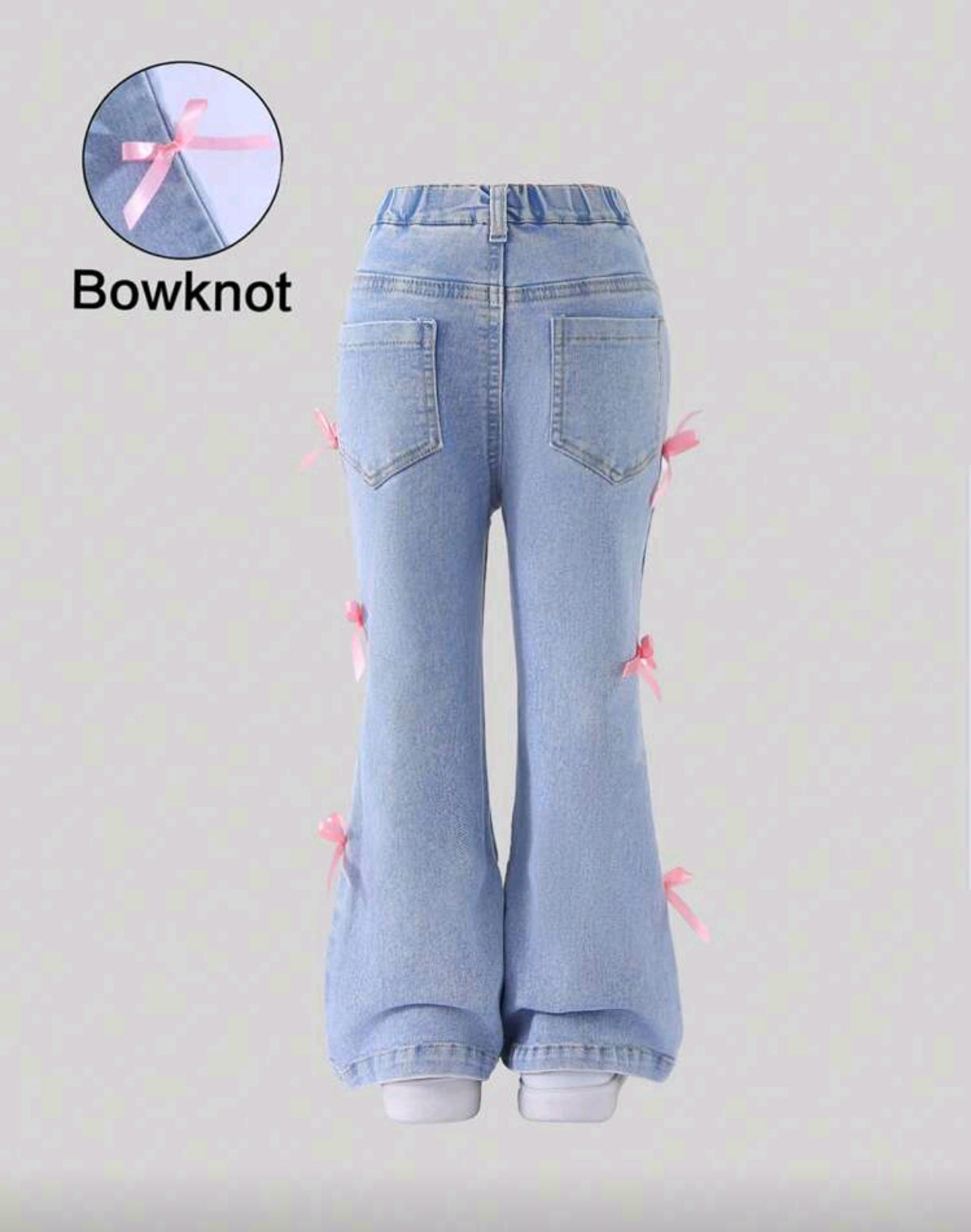 Pantalón de Jeans acampanado con moños 3D