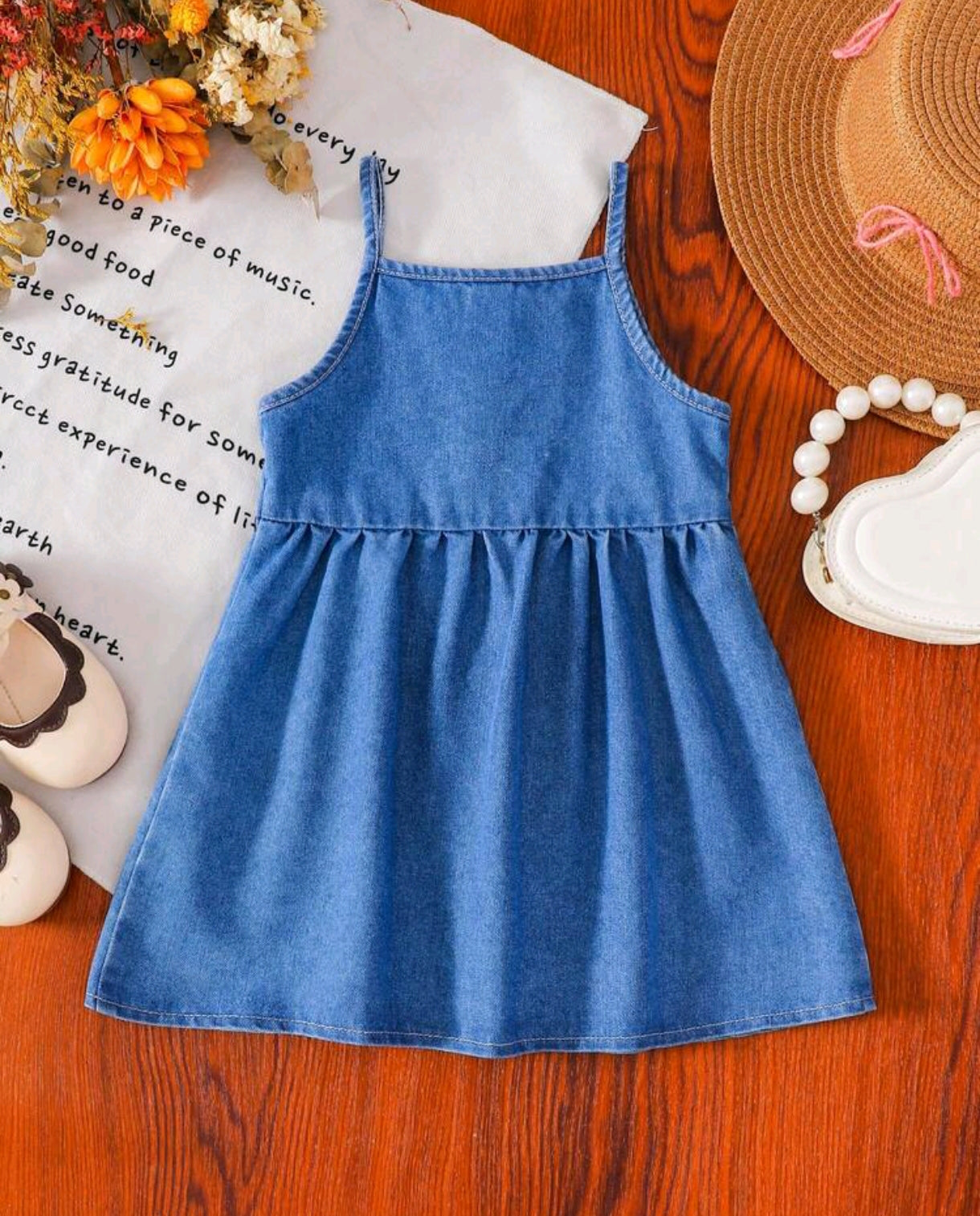 Vestido sin mangas de jeans para bebé con moño frontal