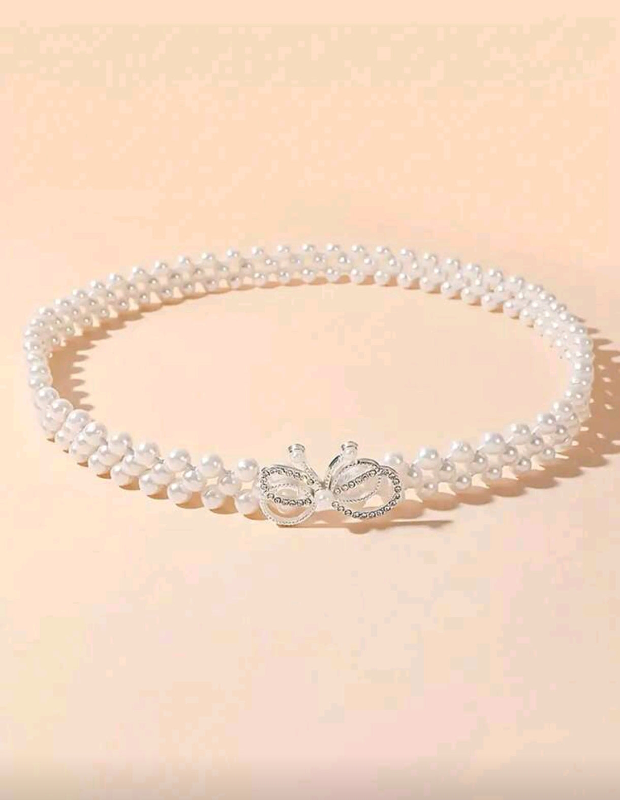 Acc. Cinto de perlitas con hebilla de moño