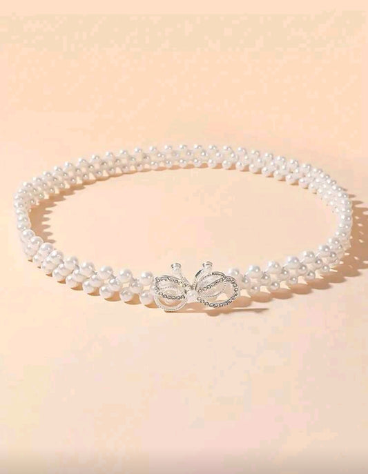 Acc. Cinto de perlitas con hebilla de moño