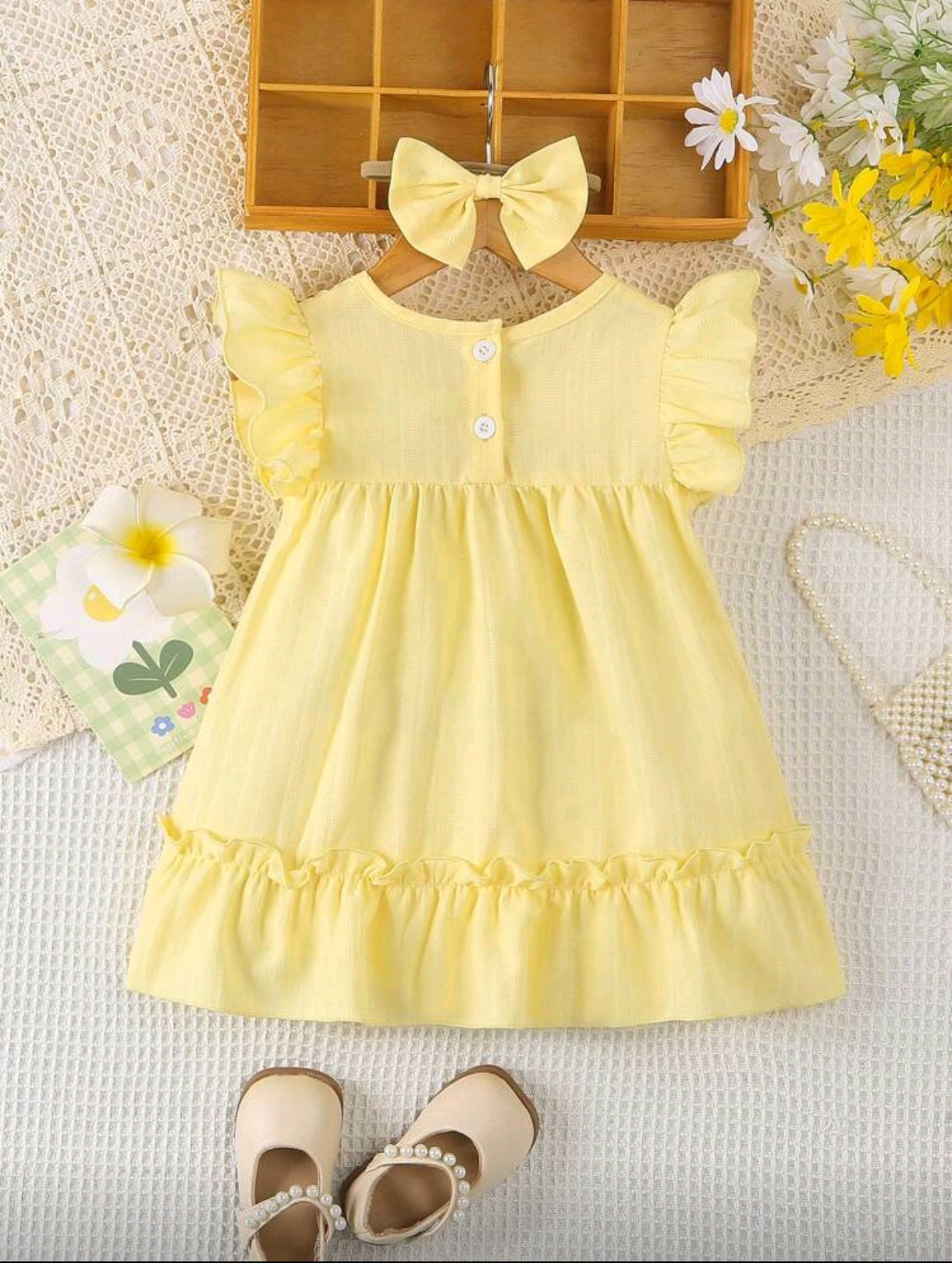 Vestido bebé con detelles en flor