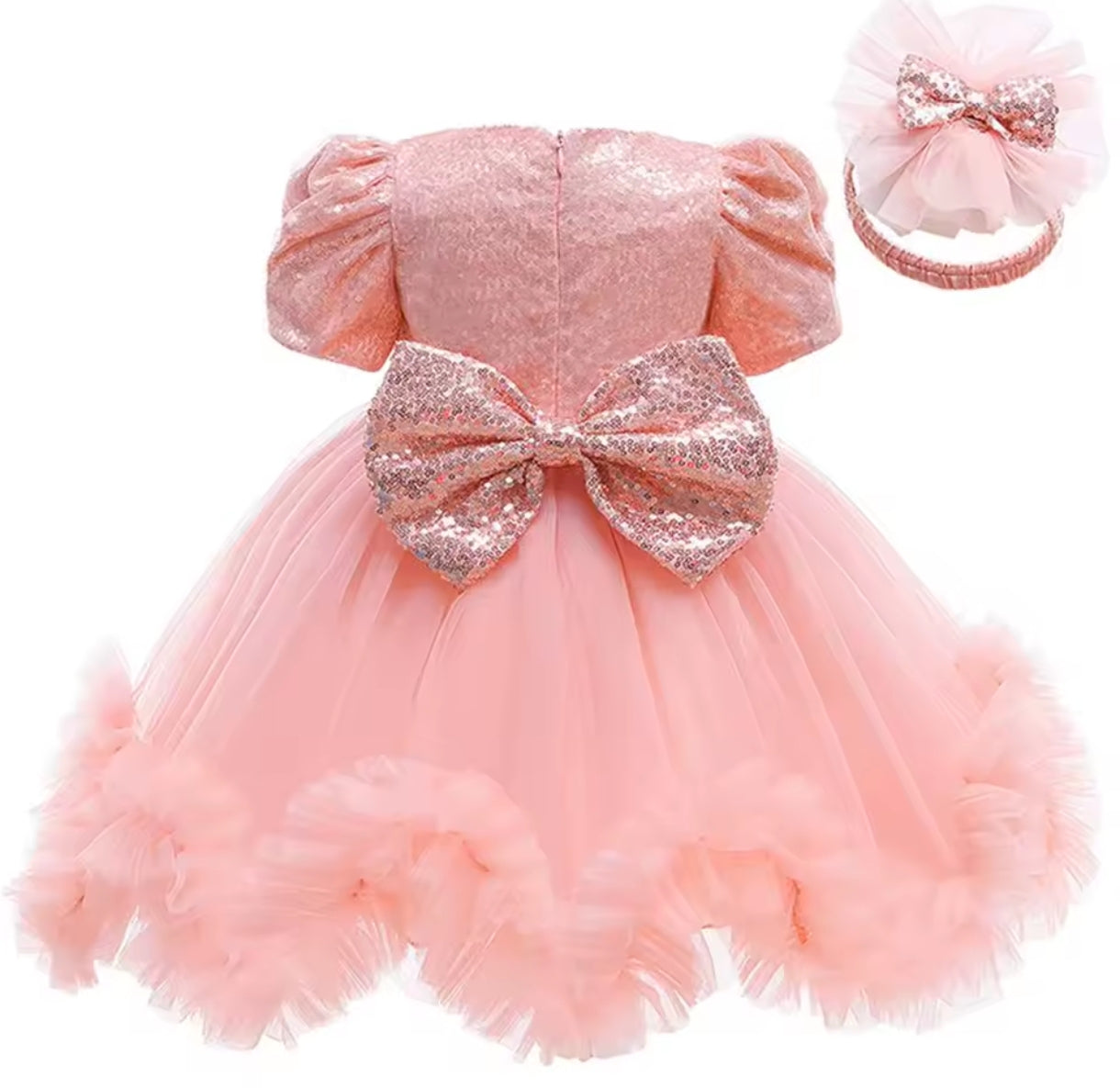 Vestido elegante con lentejuelas y moño