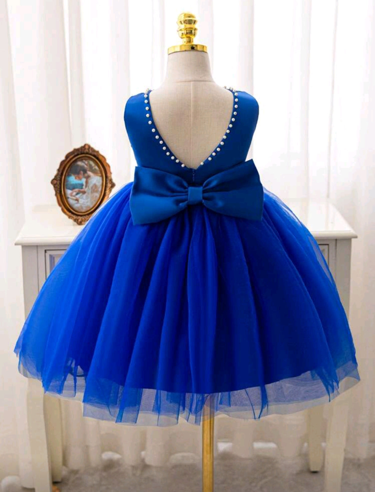 Vestido elegante con tul y detalles de perlitas