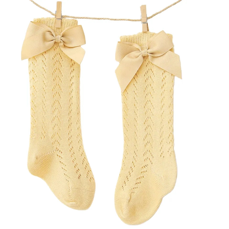 Acc. Calcetines tubo alto calado con lazo