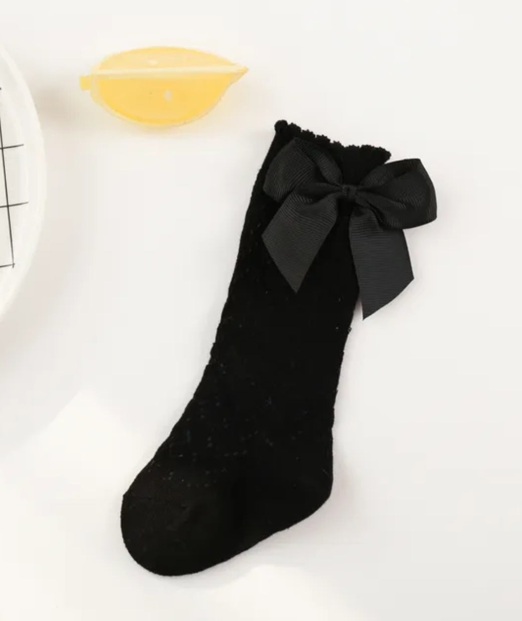Acc. Calcetines largas con moño