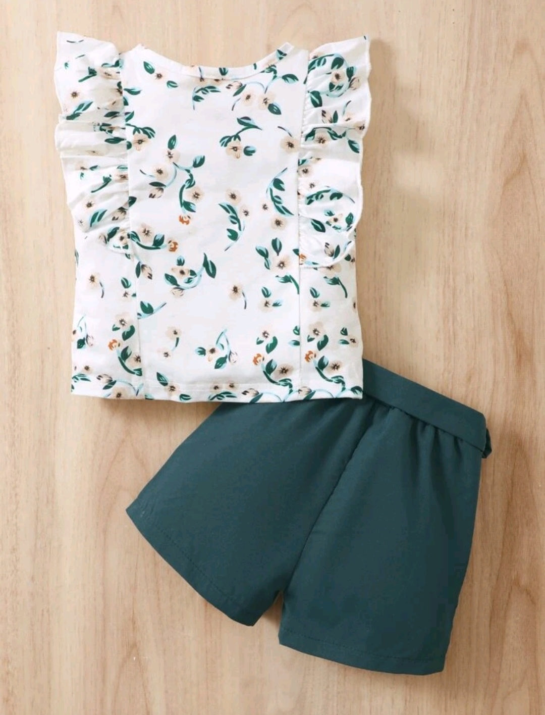 Blusa estampada + short con cinturón