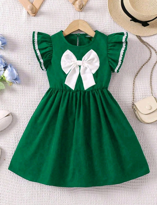 Vestido con moño frontal