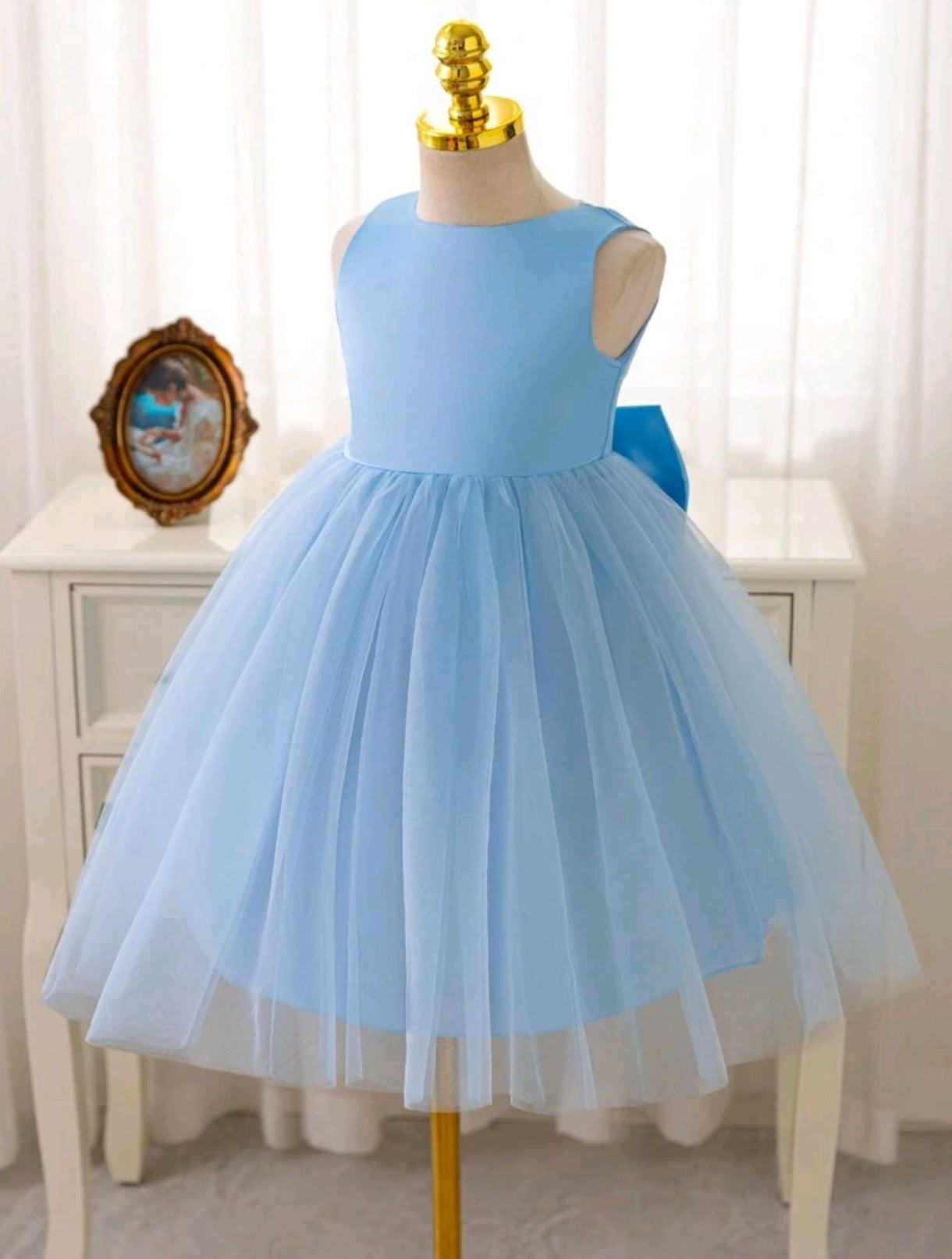 Vestido Elegante Celeste de tul y moño