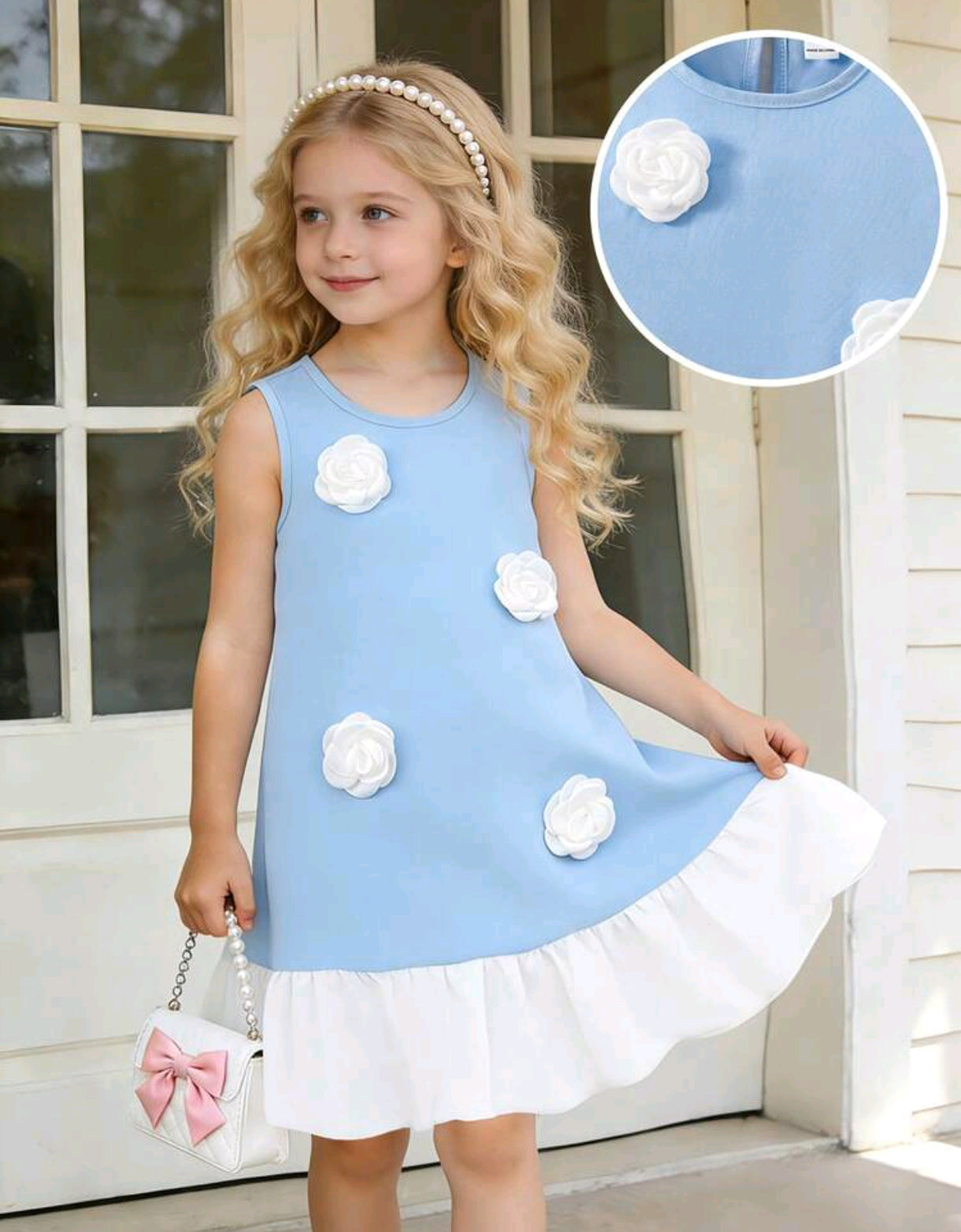 Vestido celeste sin mangas con detalles de flores 3D