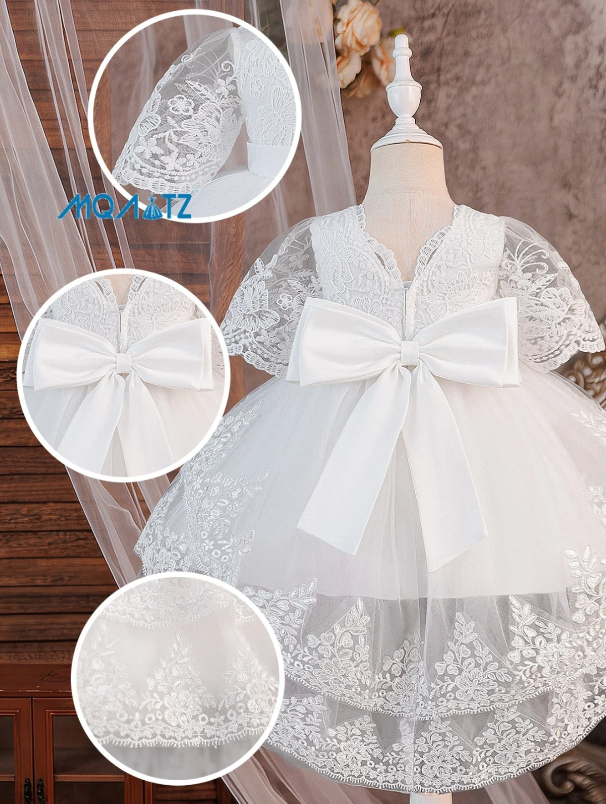 Vestido blanco bebé de renda con mangas y cola larga