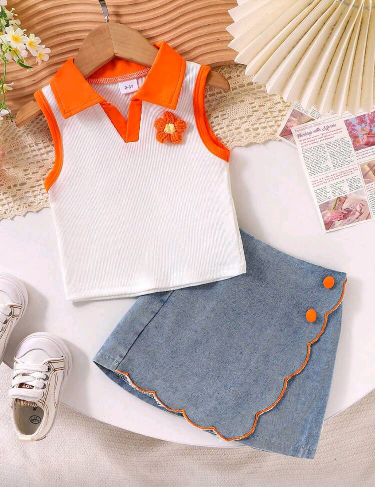 Blusa sin mangas con cuello + short pollera