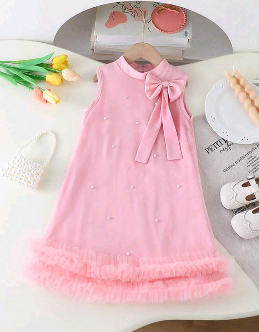 Vestido sin mangas con moño y detalles en perlitas