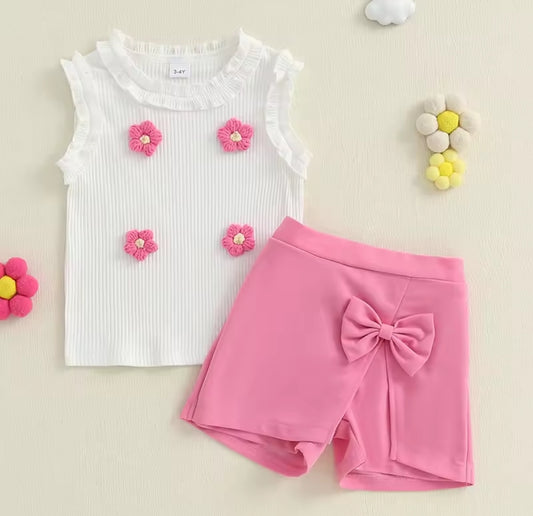 Blusa con detalles de flores + short pollera