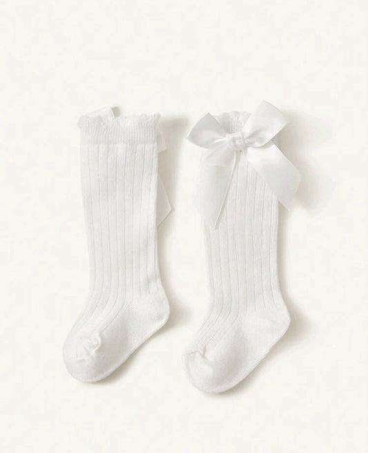 Acc. Medias largas con moño
