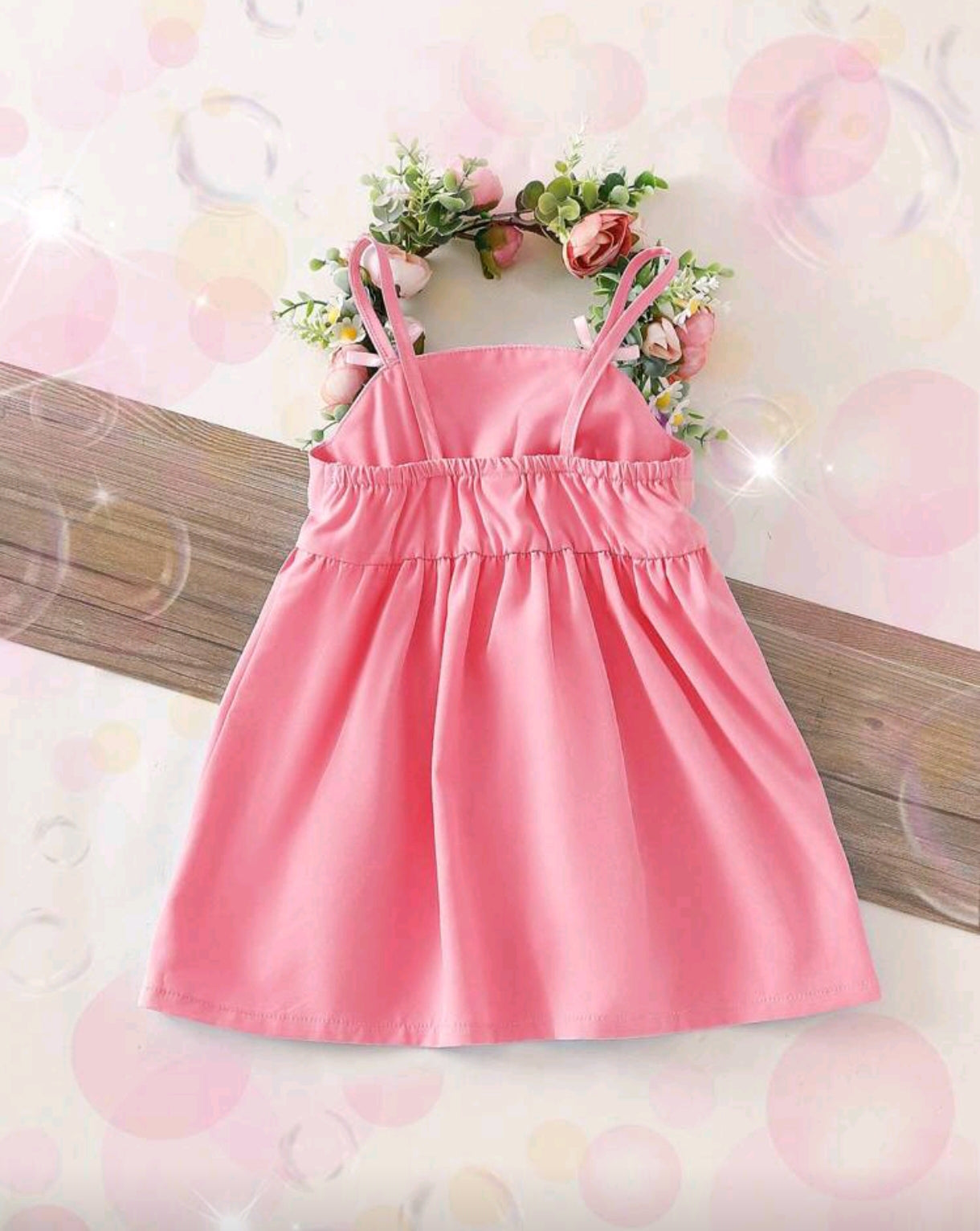 Vestido bebe de tiritas y detalles en moño
