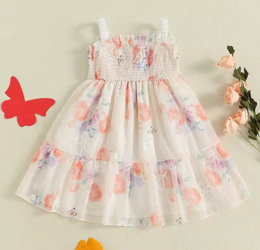 Vestido floral con detalles en alitas