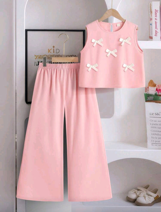 Blusa con moños + pantalón