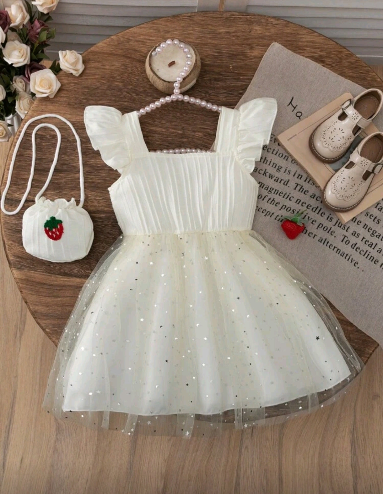 Vestido con bordados y tul con brillos