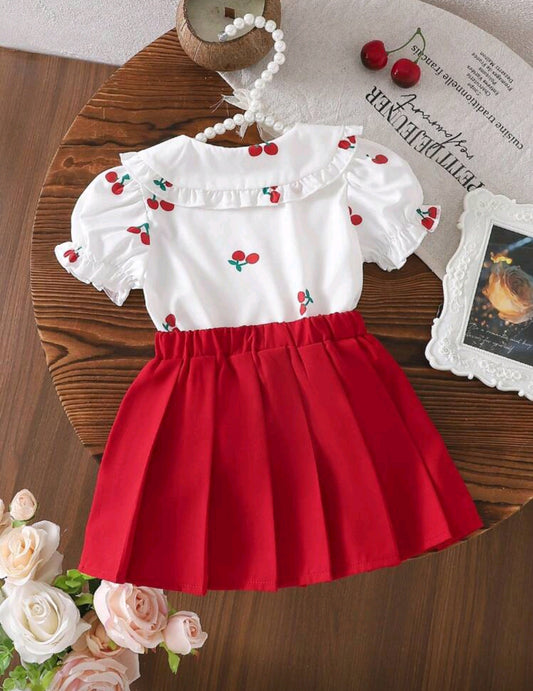 Camisa con diseño de cereza + falda plisada