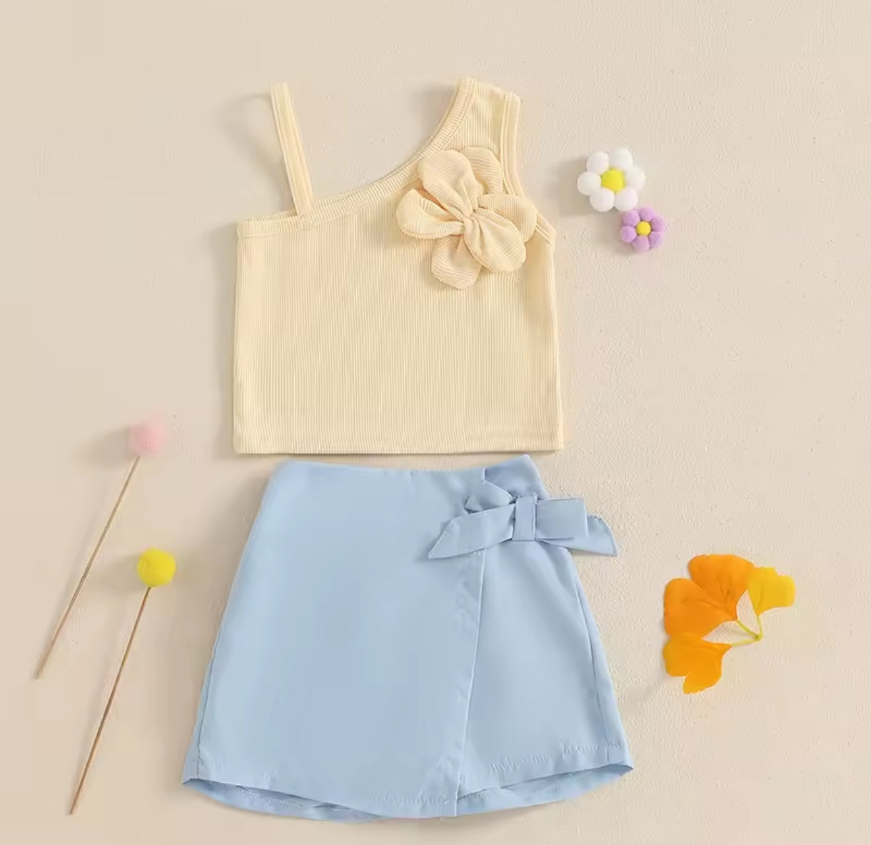 Blusa asimétrica+ short pollera