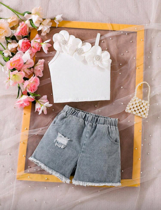 Blusa de mangas asimétrica + short de Jeans