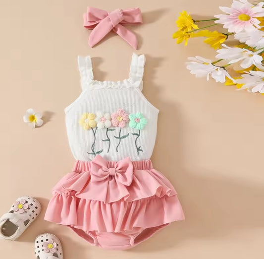 Body acabado con flores + short pollera