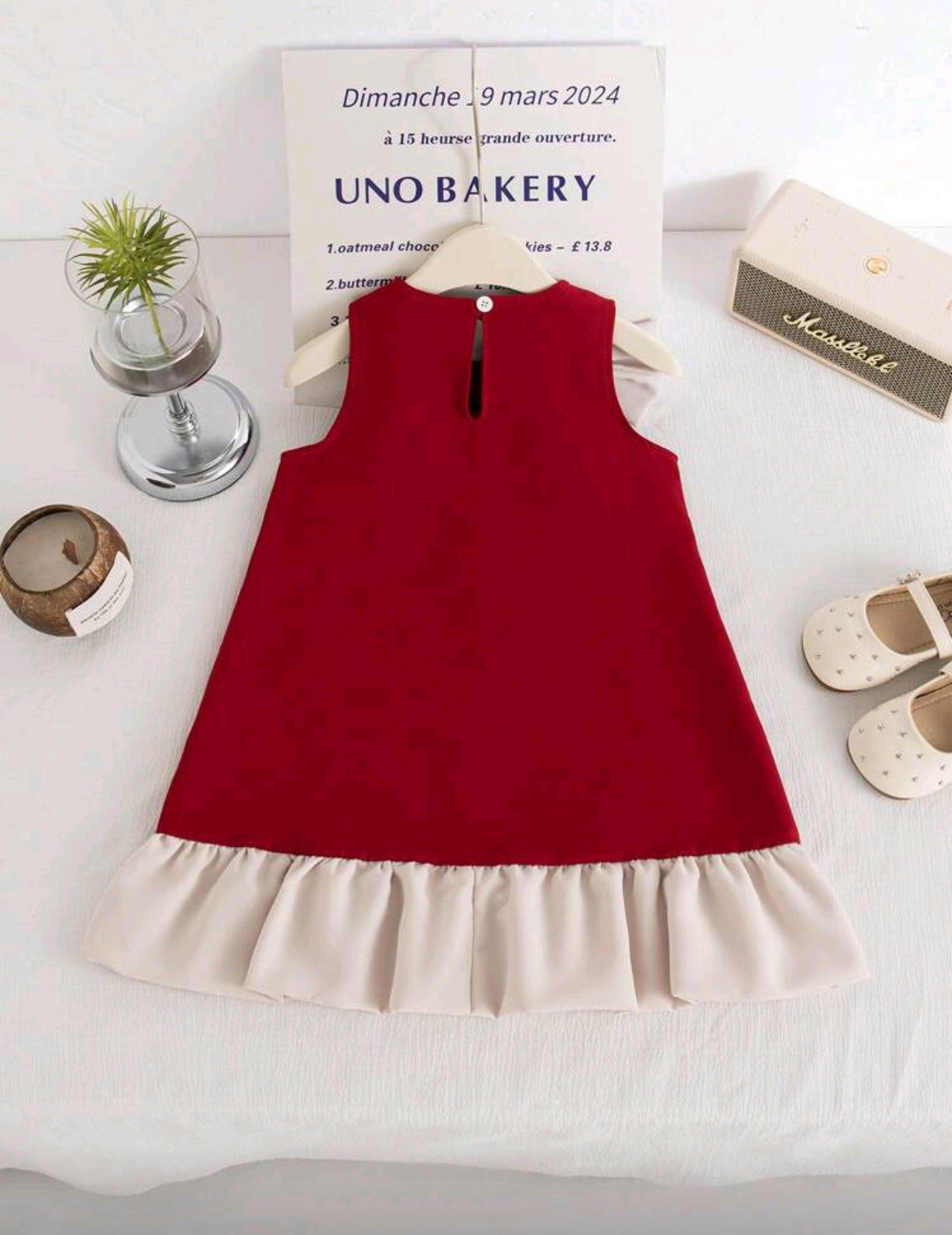 Vestido chic con detelles en perlitas y moño