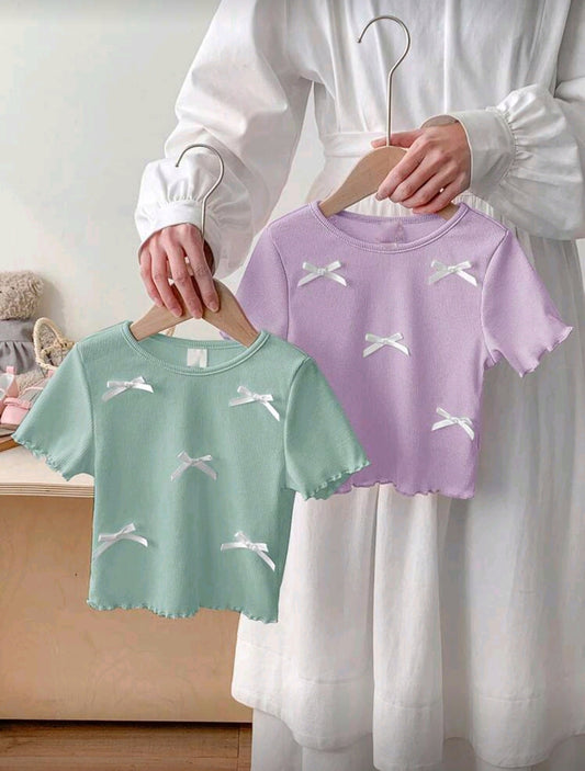 Blusa acanalada con detalles en moños