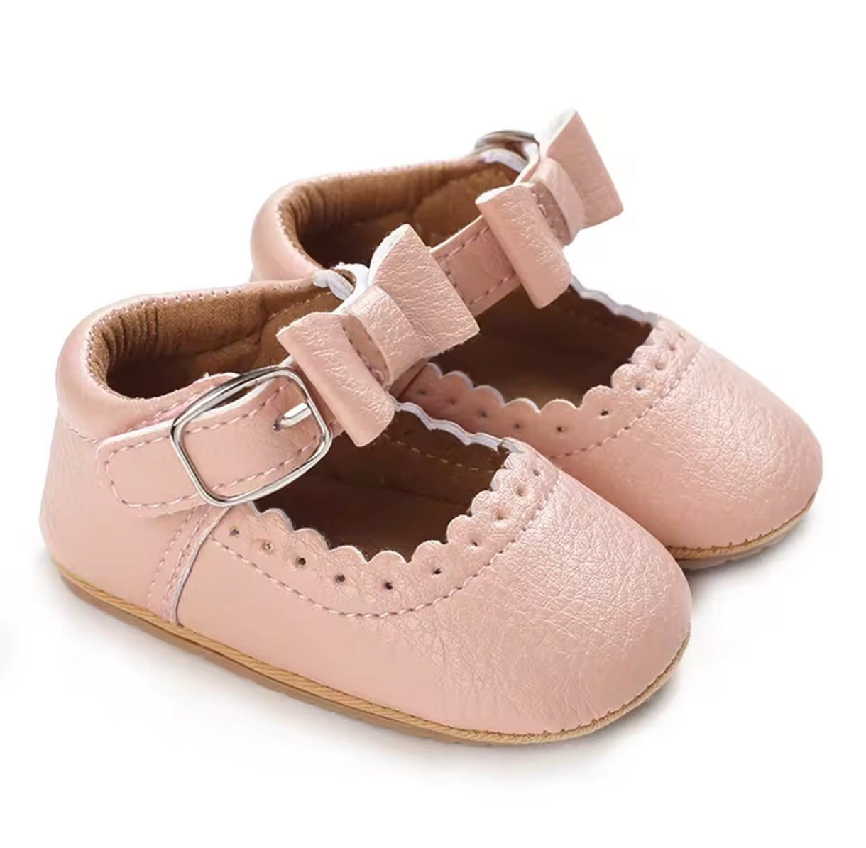 Acc. Zapato con moño suela engomada