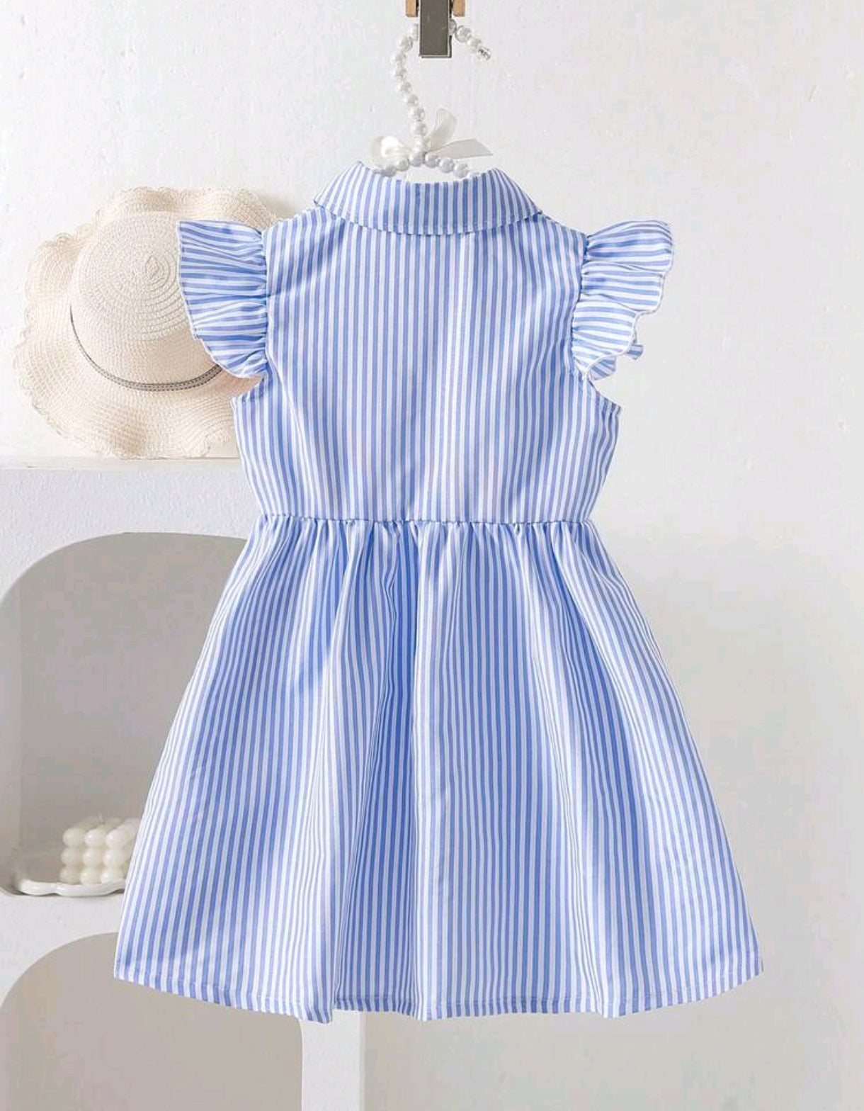 Vestido a Rayas con detalle en flor 3D