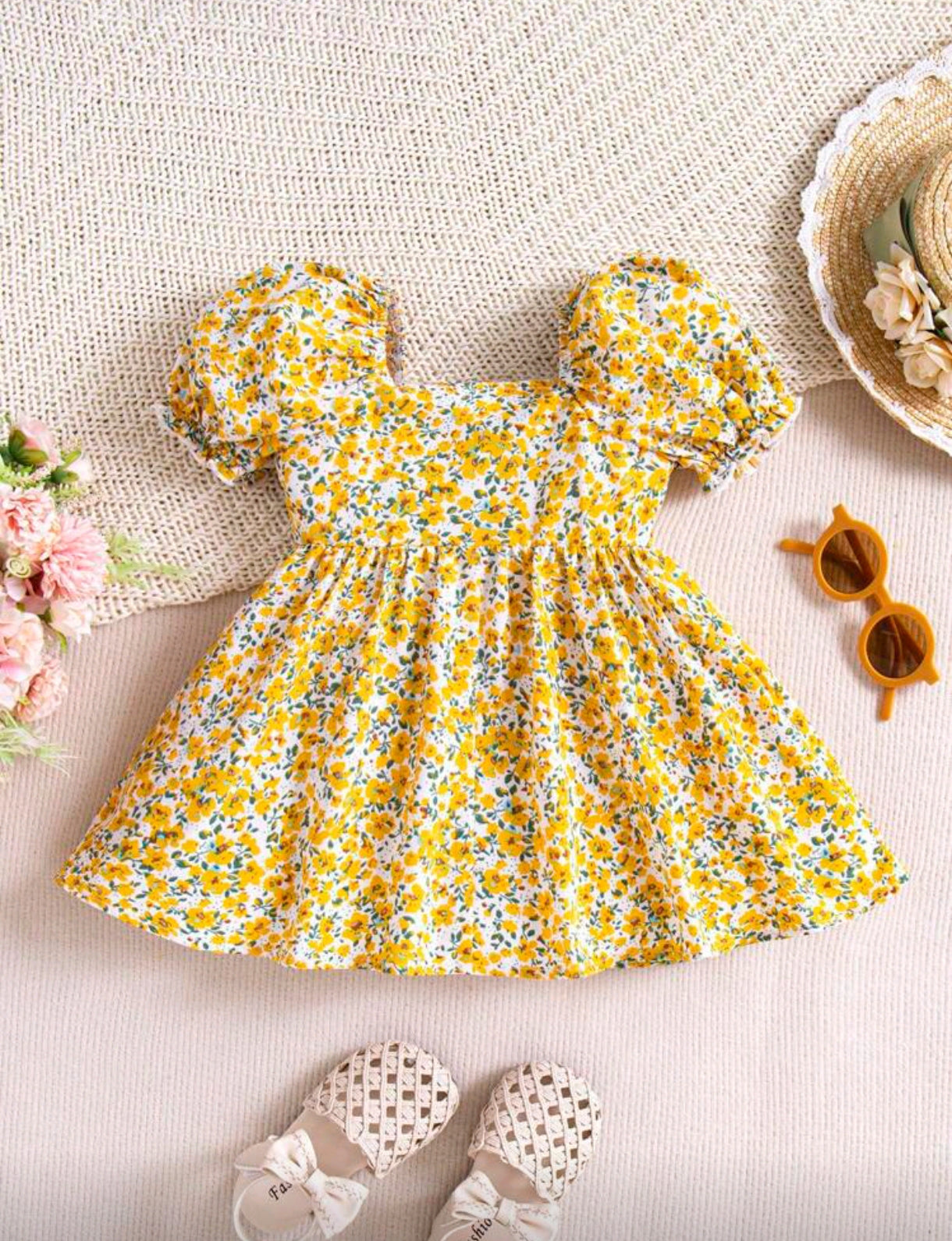 Vestido bebé floral con mangas