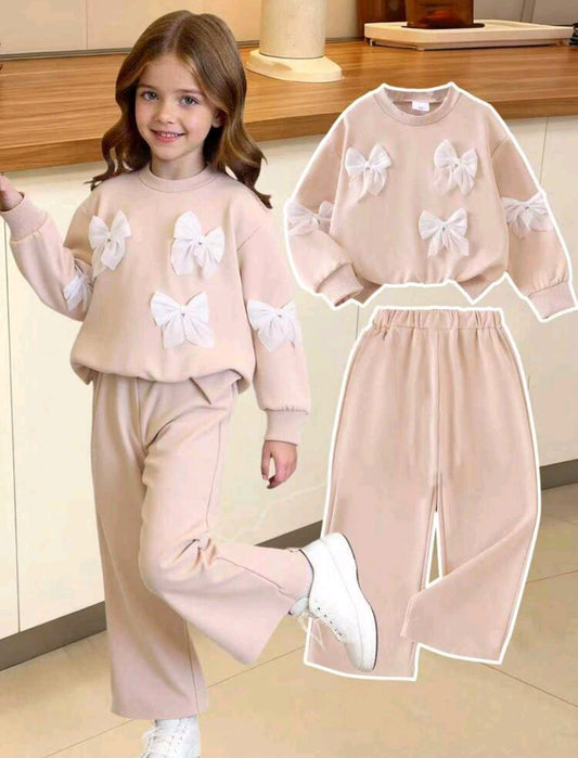 Abrigo con detalles en moños+ pantalón