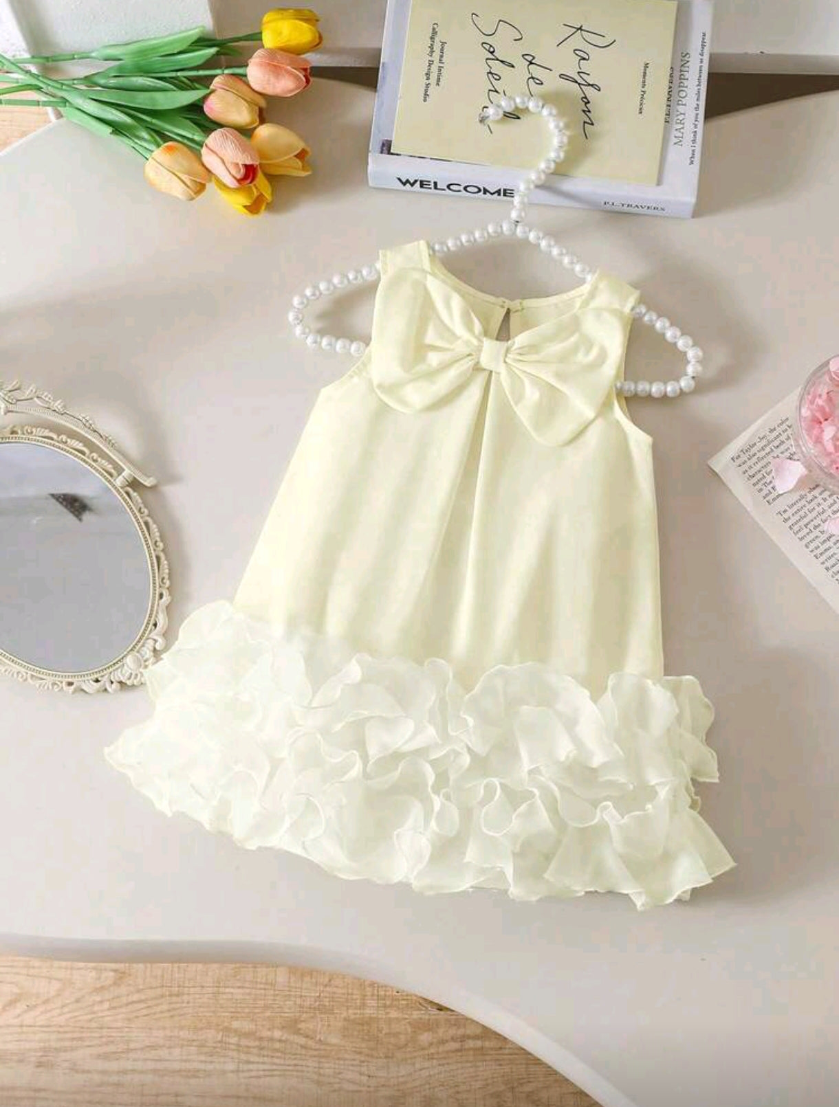 Vestido bebe sin manga con moño