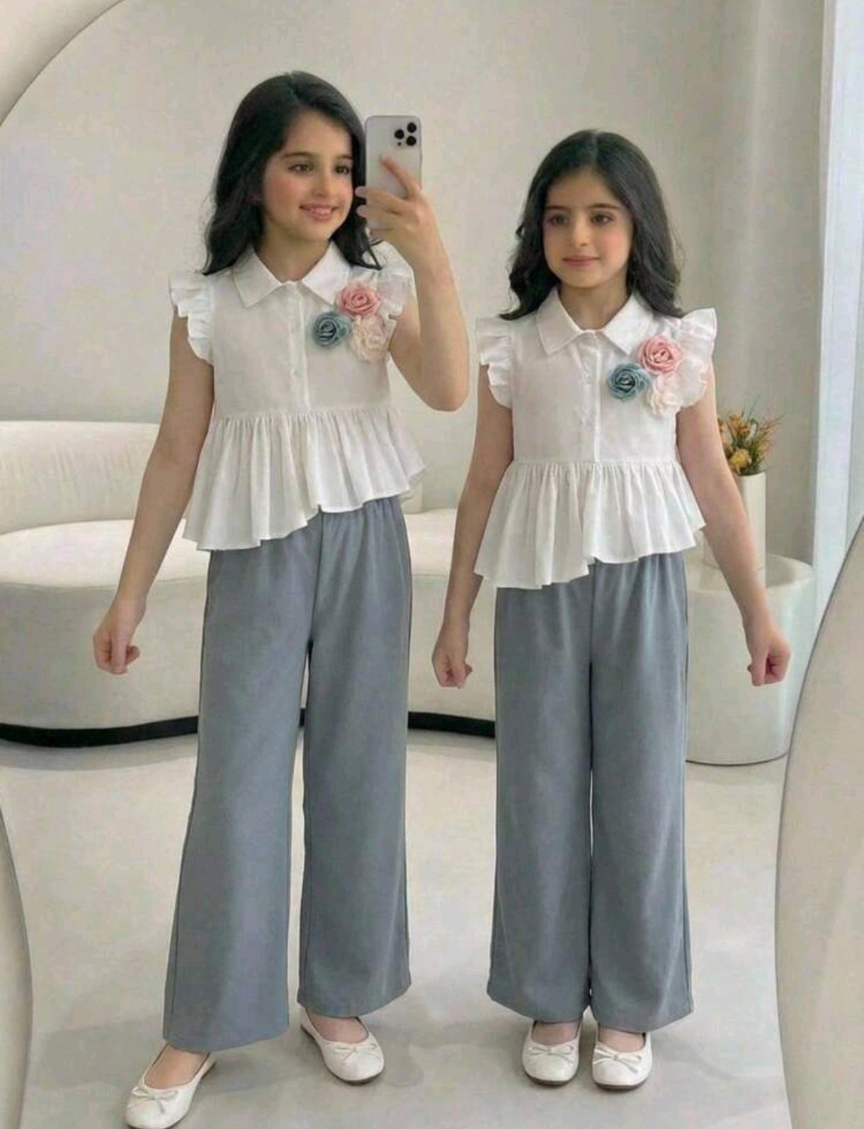 Camisa asimetrica con detalles de flores + pantalón Elegante