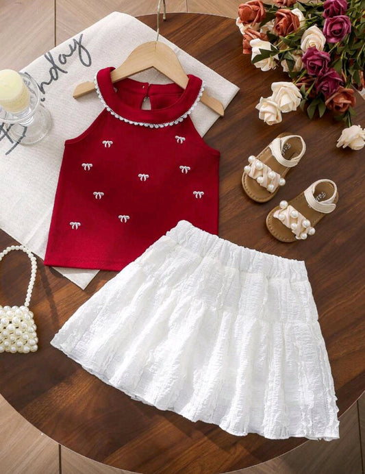 Blusa sin mangas + falda